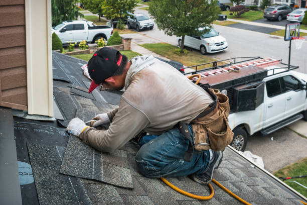 Professional Roofing technician working in Conesus, NY